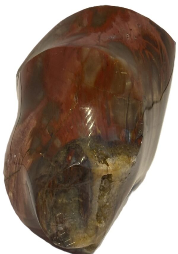Carnelian flame 1 3 sians emporium Hand carved polished carnelian flame sculpture featuring twisting ridges with deep mahogany red burnt orange tones and smoky chalcedony patches isolated on a white background